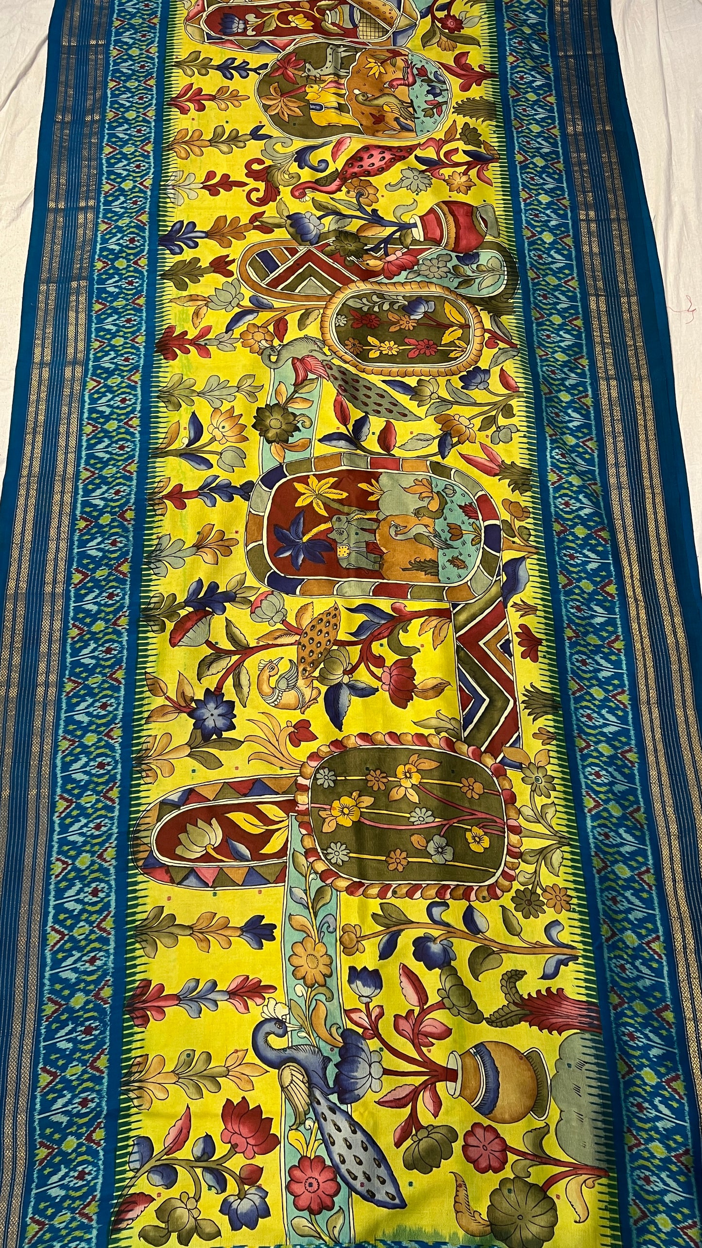 Ikkat Kanchi border Madthas patola saree