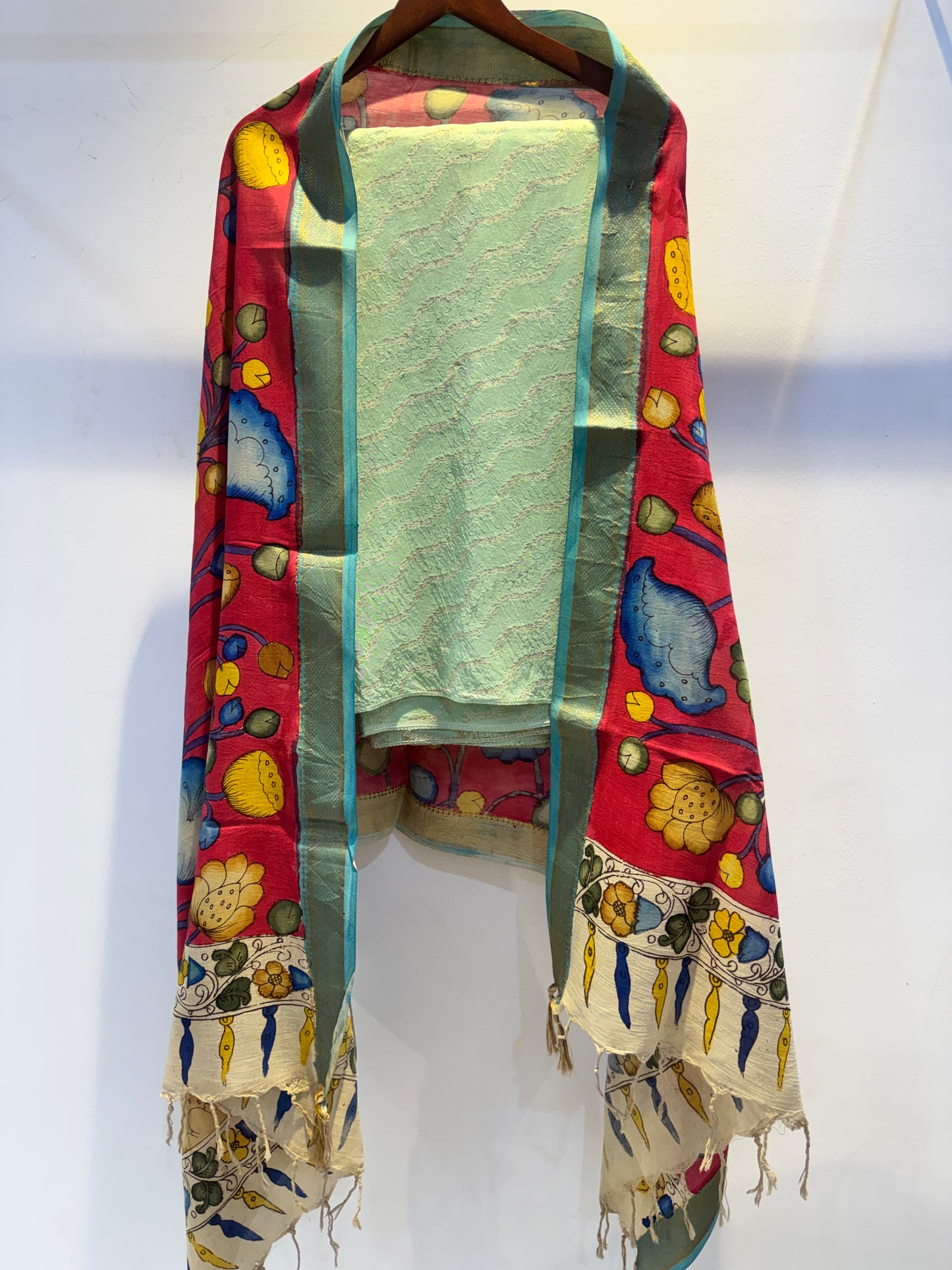 Banaras Tissue suit paired with pen kalamkari duppata