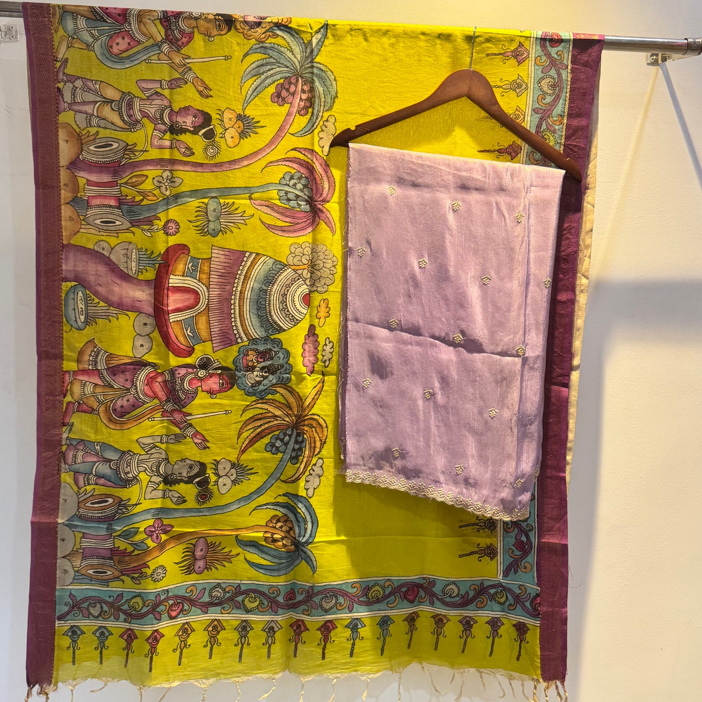 Golden Tissue suit paired with pen kalamkari duppata