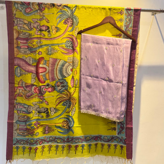 Golden Tissue suit paired with pen kalamkari duppata