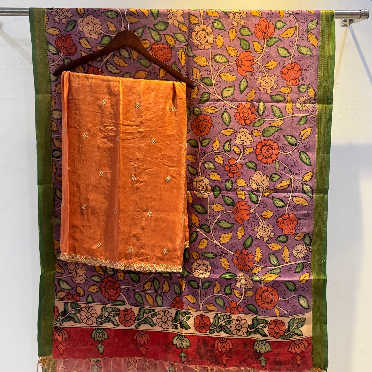 Golden Tissue suit paired with pen kalamkari duppata