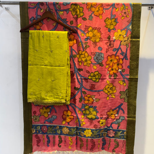 Golden Tissue suit paired with pen kalamkari duppata