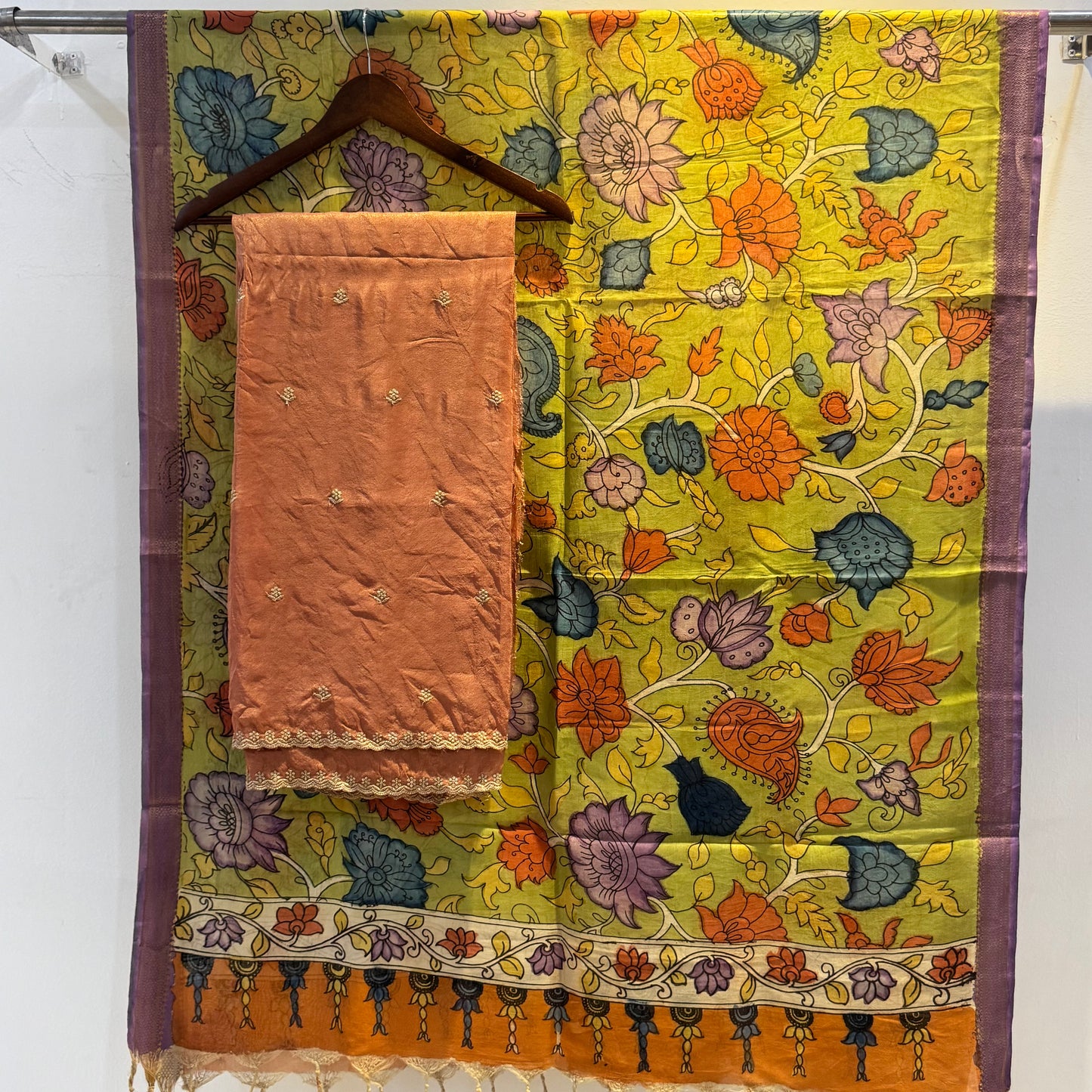 Golden Tissue suit paired with pen kalamkari duppata