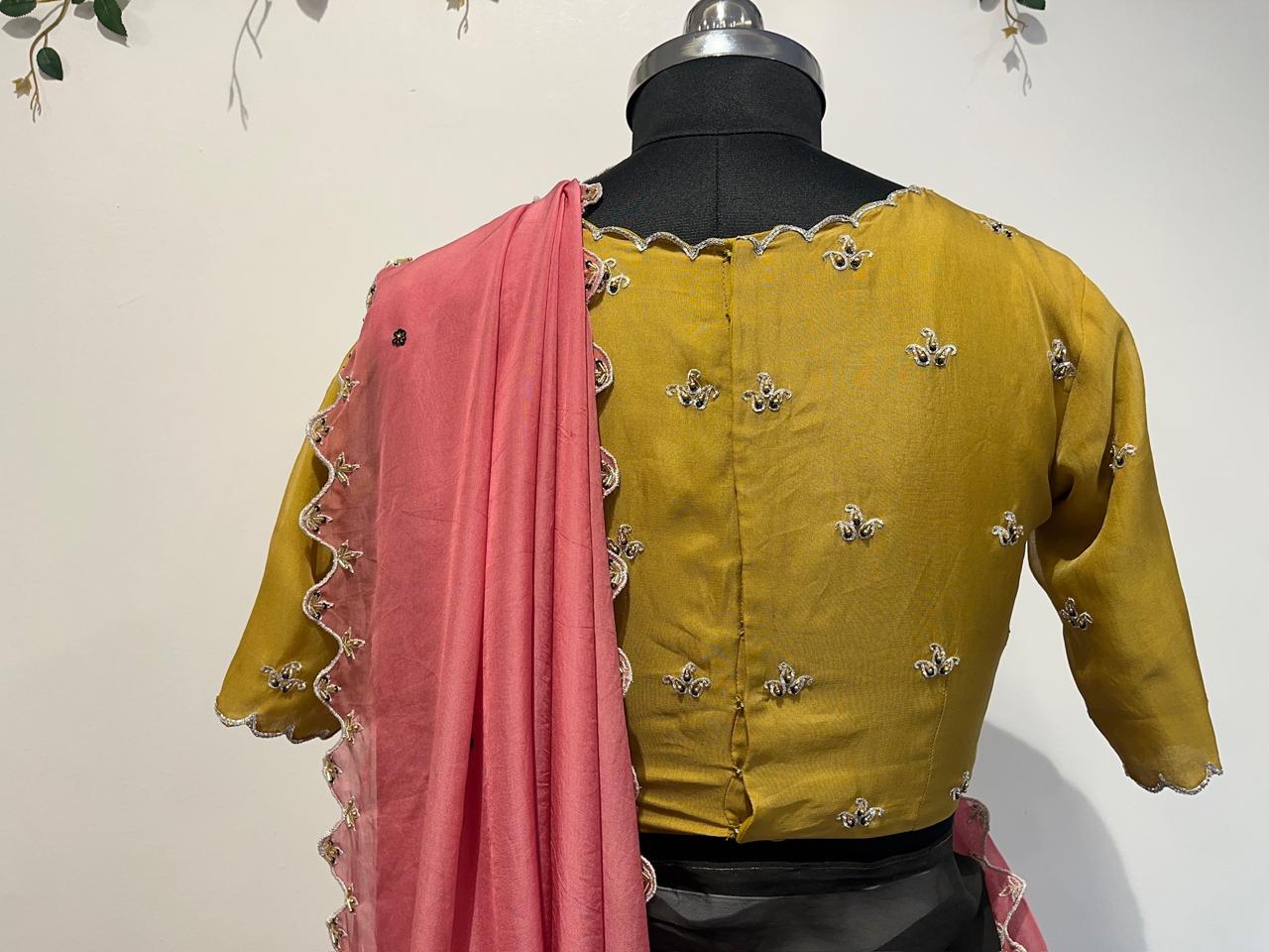 Half Kalamkari Organza Saree with Cutwork & Maggam Blouse